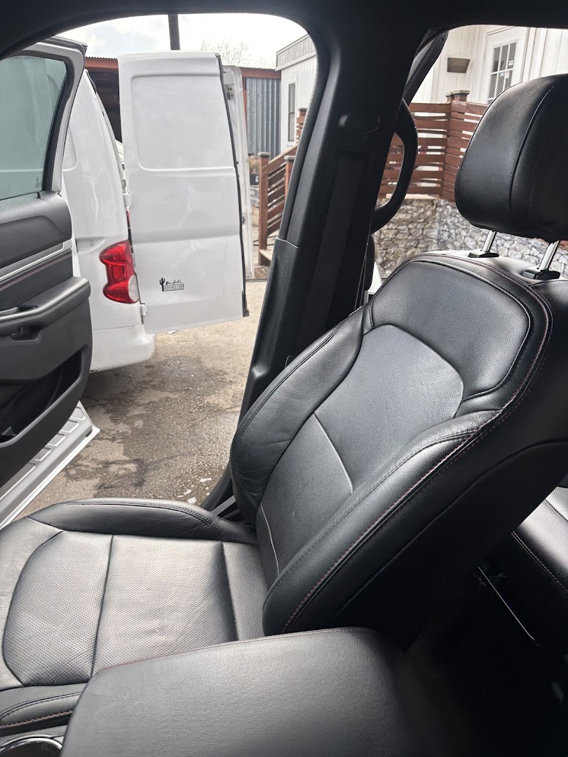 Deep cleaned leather seats after mobile detail in San Antonio